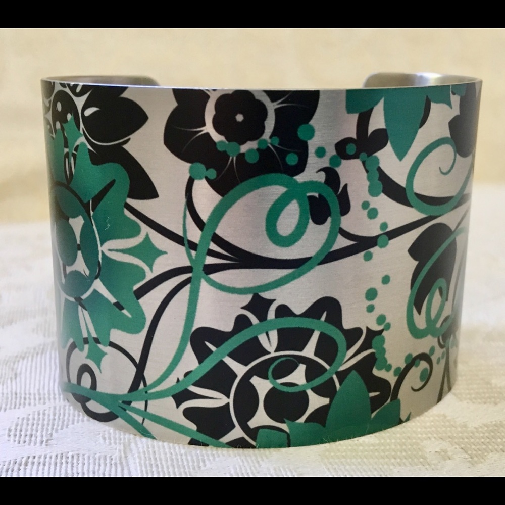 Tattooed Steel wide cuff bracelet. Very nice.